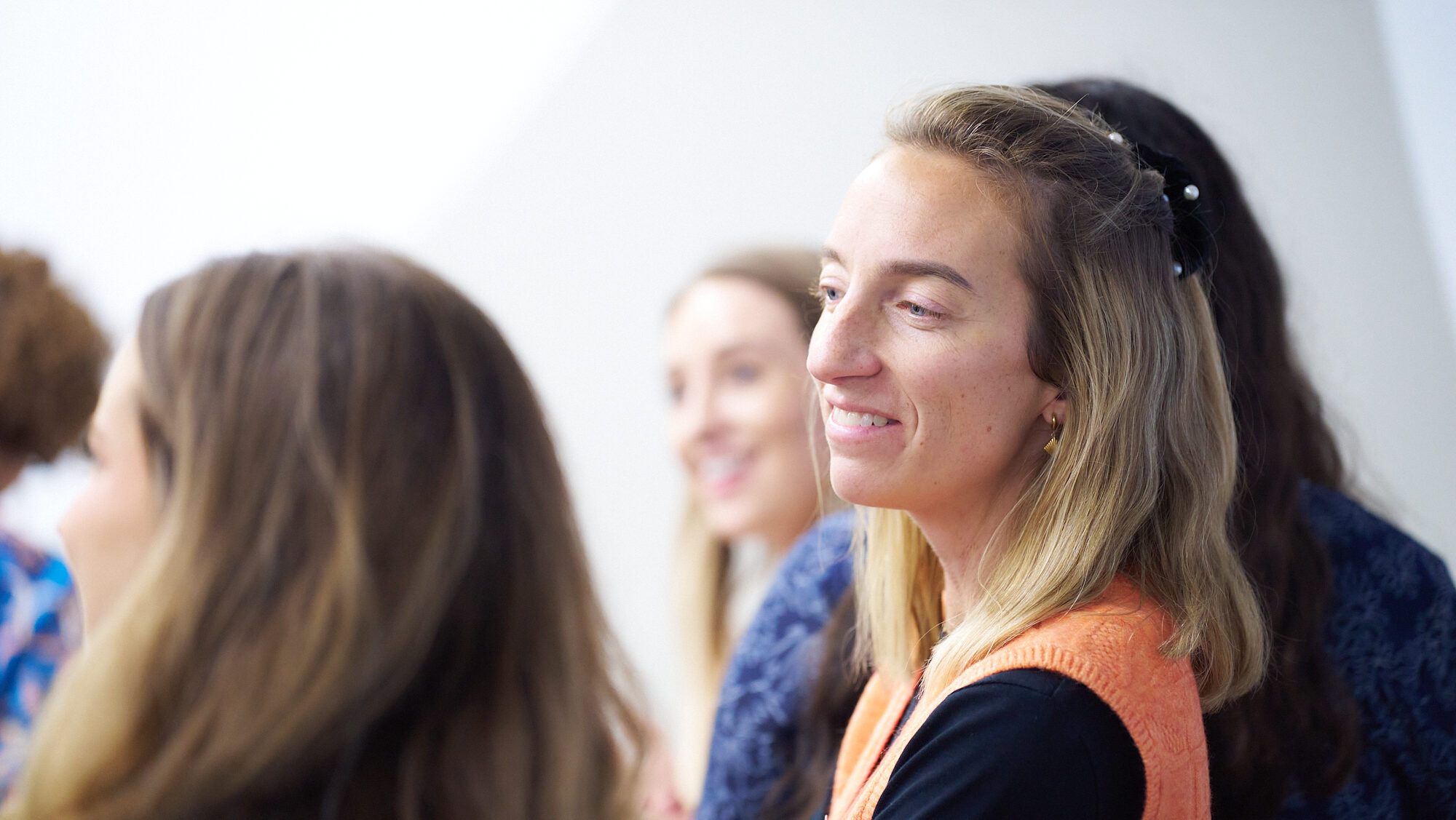 EarthScale staff member smiling at Leeds kick off event
