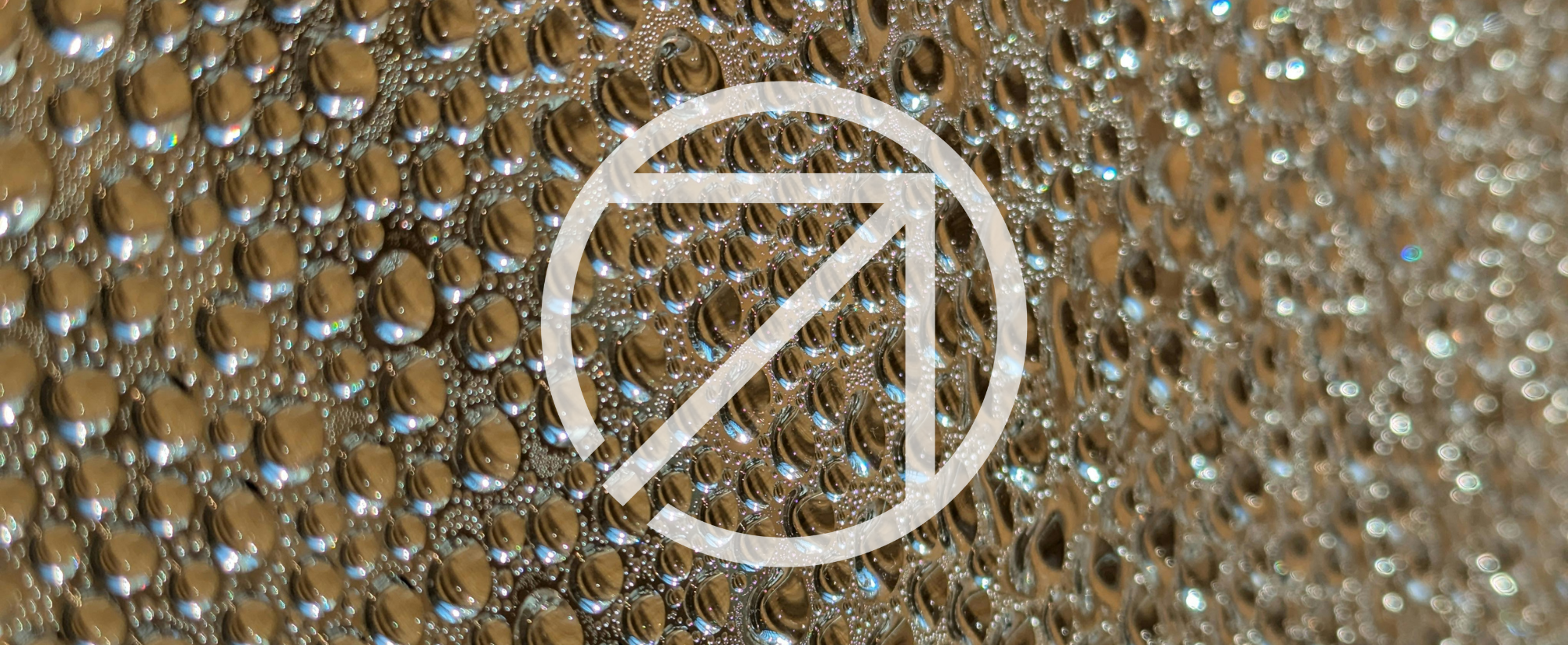 Banner with water bubbles on a glass surface with EarthScale logo overlaid