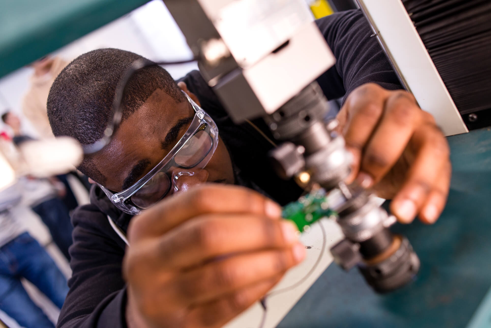 A person using equipment at the STEM Centre