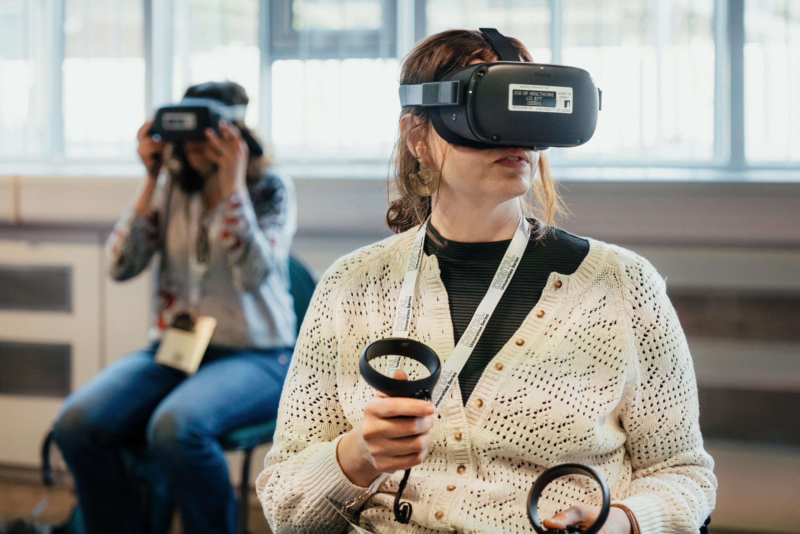 A woman using VR equipment at HELIX